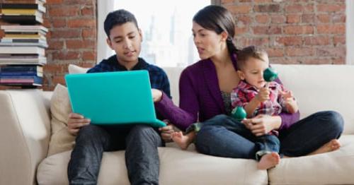 A parent monitoring her child’s online activity. 